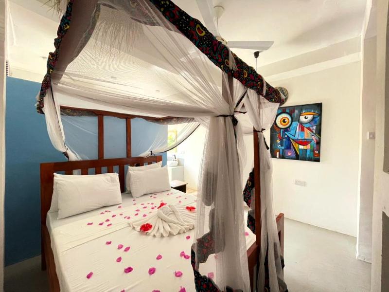 Asante Sana Beach Cottages image