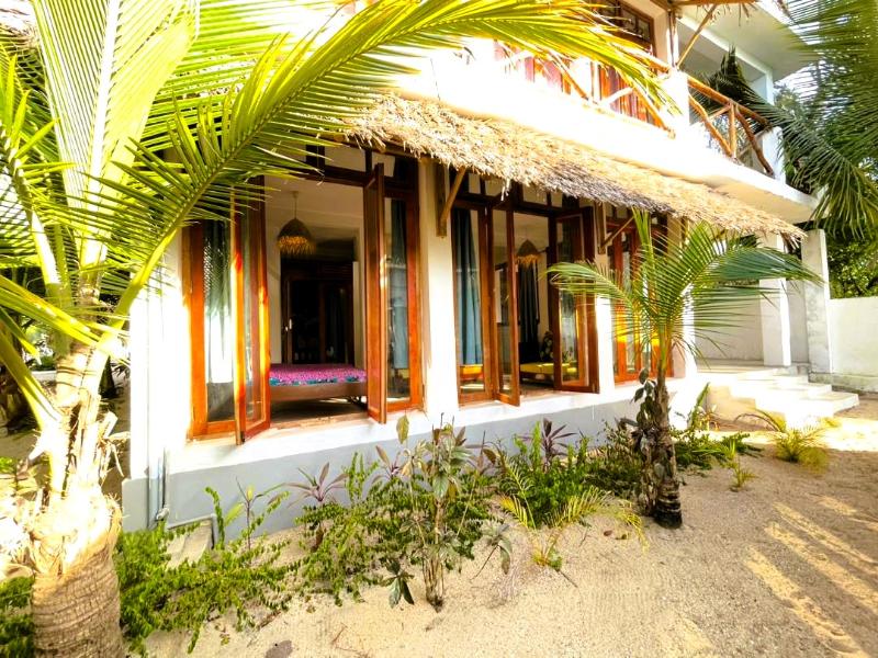 Asante Sana Beach Cottages image