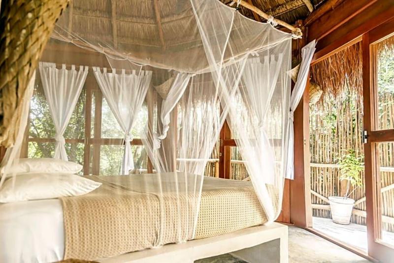 Mamasan Treehouses & Cabins image