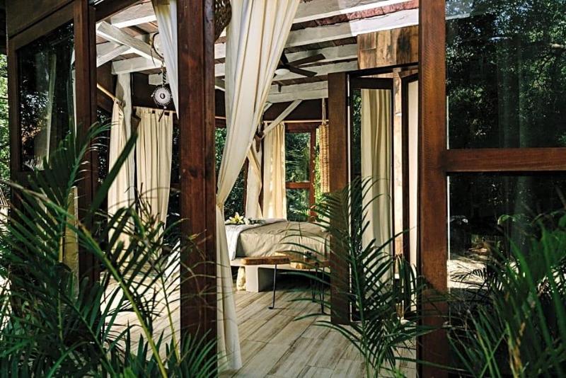 Mamasan Treehouses & Cabins image