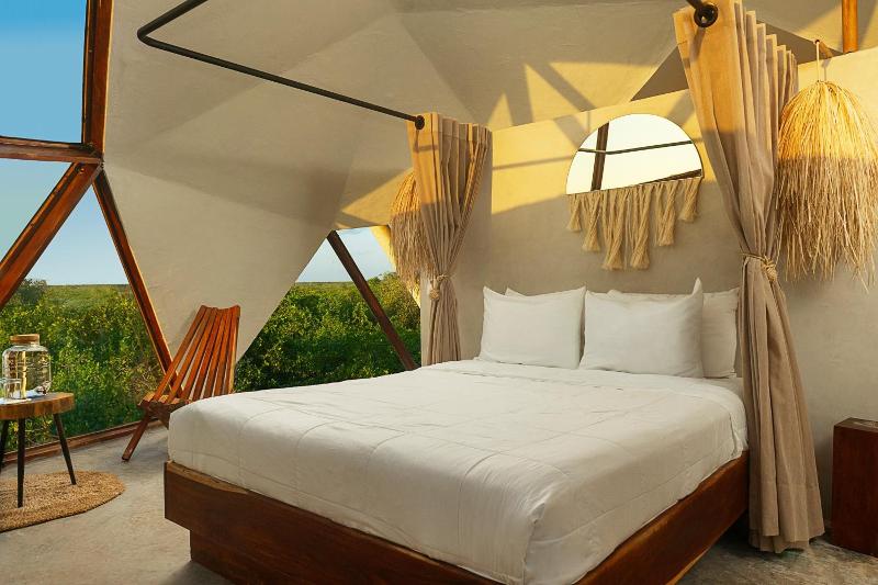 Mamasan Treehouses & Cabins image