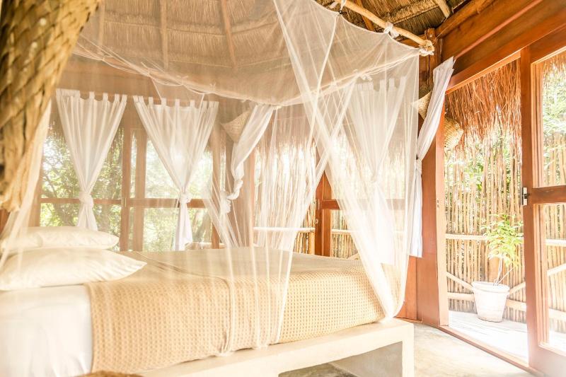 Mamasan Treehouses & Cabins image