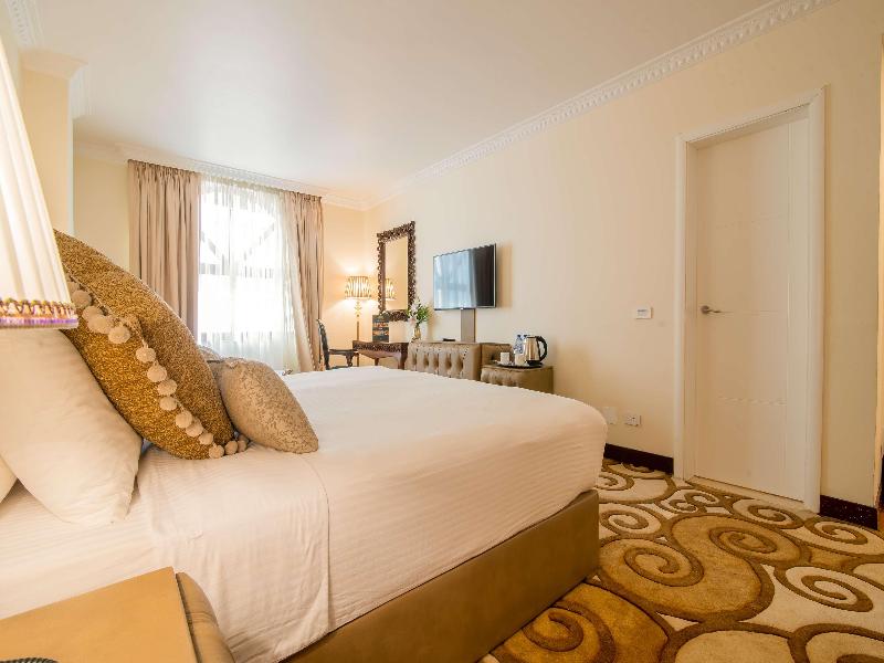 Suites At The Grand Palace Hotel image