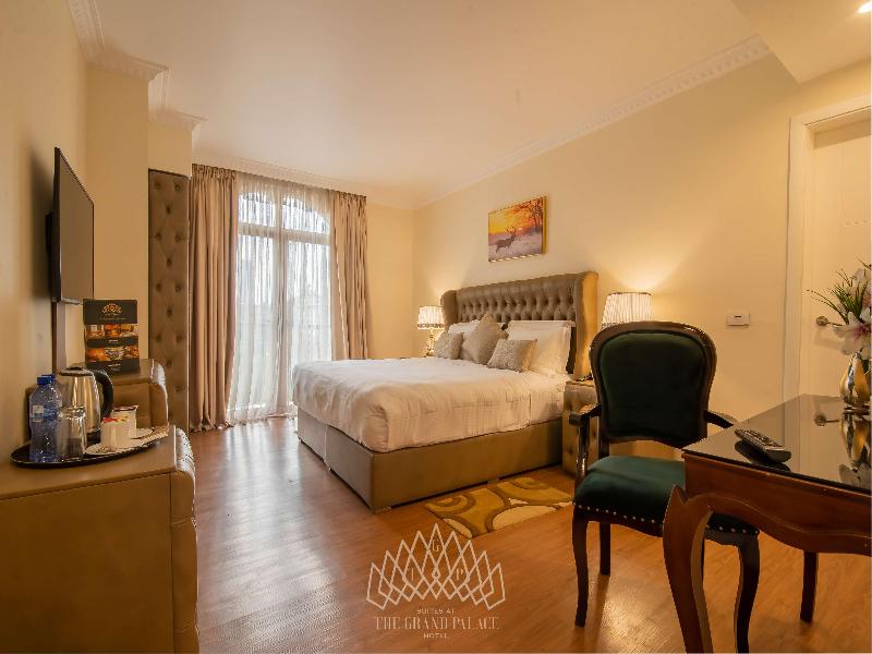 Suites At The Grand Palace Hotel image