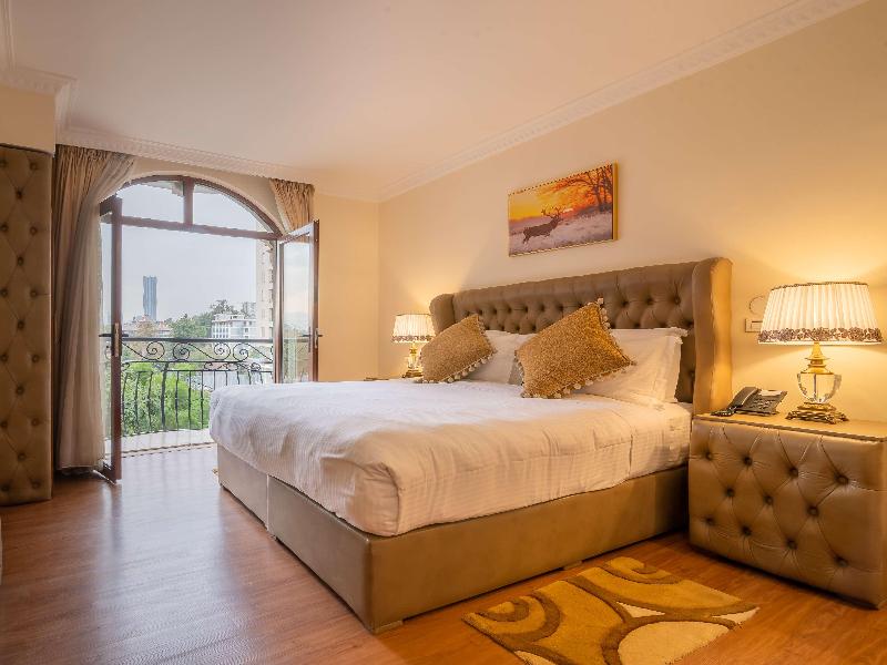 Suites At The Grand Palace Hotel image