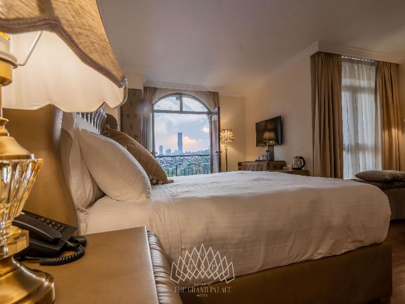Suites At The Grand Palace Hotel image