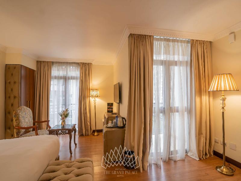 Suites At The Grand Palace Hotel image
