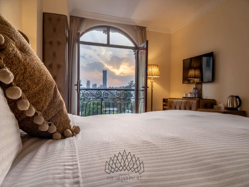 Suites At The Grand Palace Hotel image