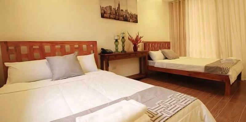 A A Garden Suites image