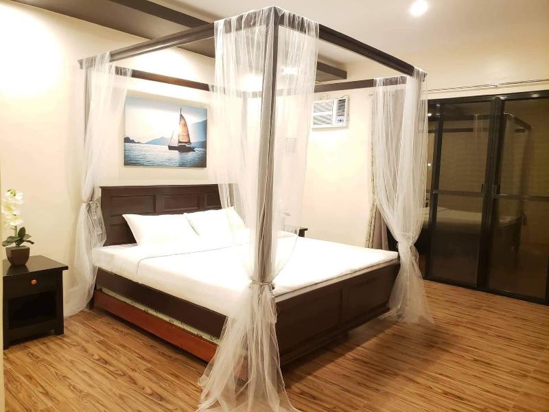 A A Garden Suites image