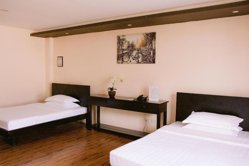 A A Garden Suites image