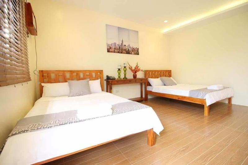 A A Garden Suites image
