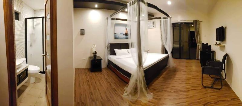 A A Garden Suites image