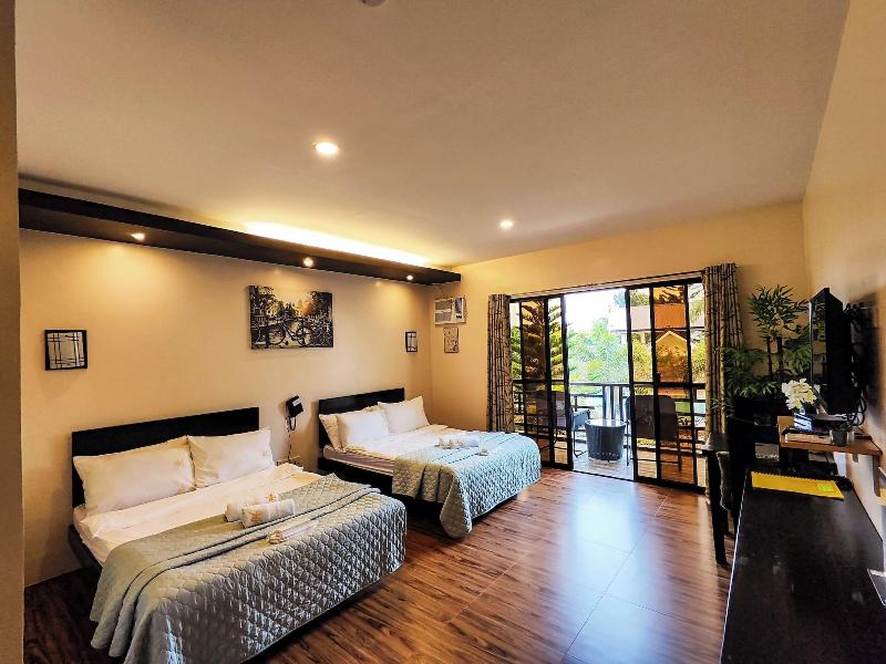 A A Garden Suites image