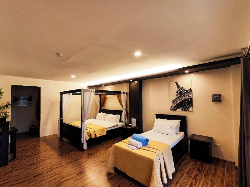 A A Garden Suites image