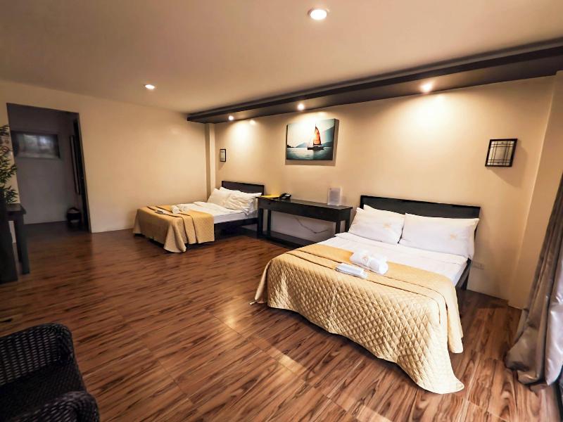 A A Garden Suites image