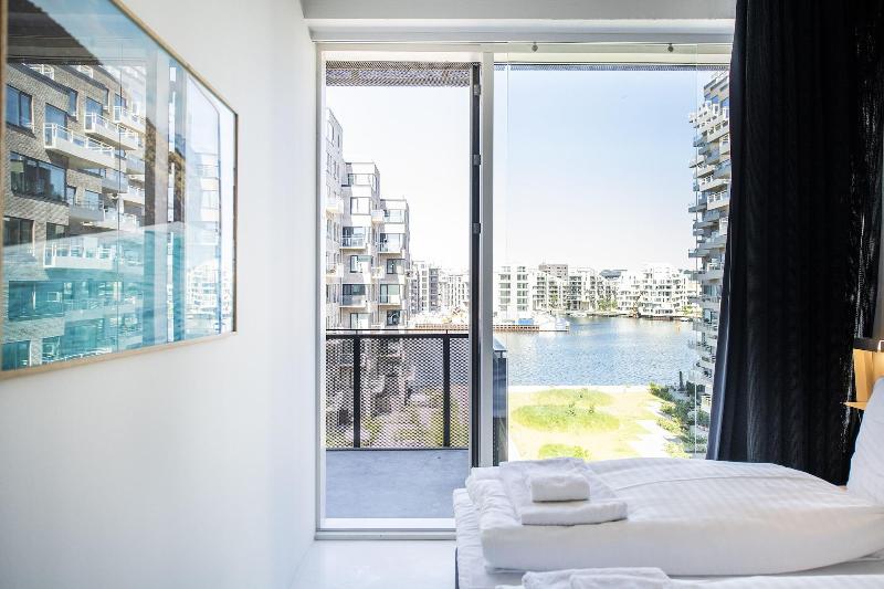By The Pier Apartments Into This Place image