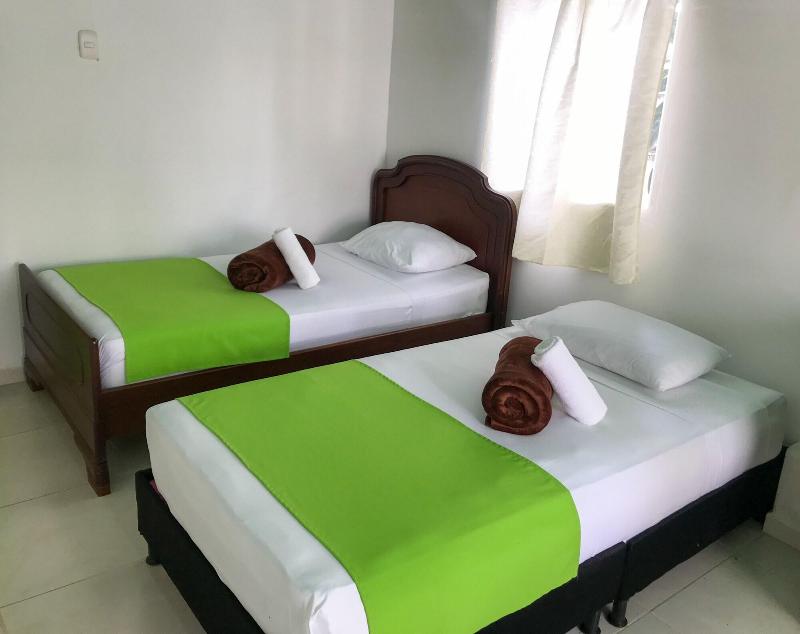 Room With 1 Double Bed And 2 Single Beds Number 8 image