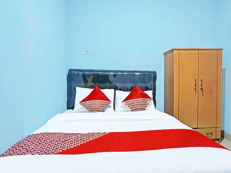 Super OYO 91535 J&b Rooms Tomang image