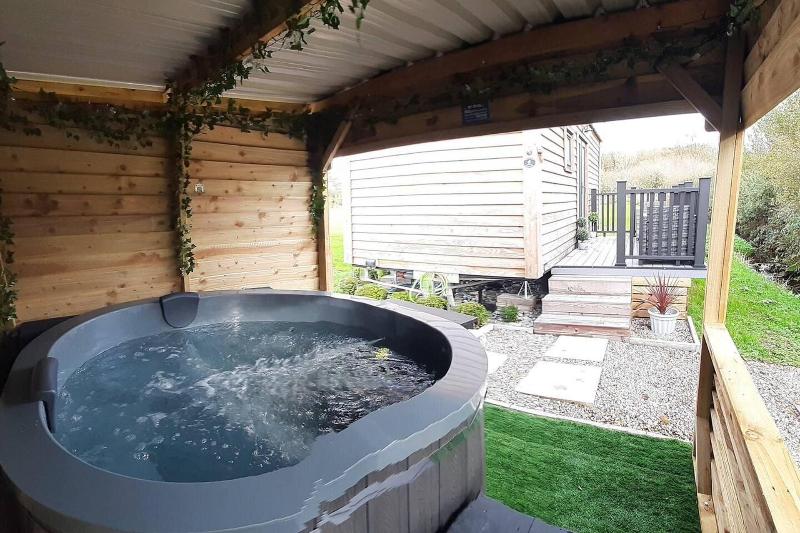 Luxury Shepherds Hut With Spa Hot Tub On Anglesey image