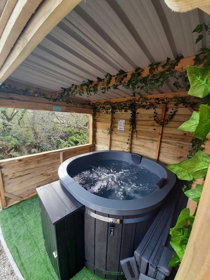 Luxury Shepherds Hut With Spa Hot Tub On Anglesey image