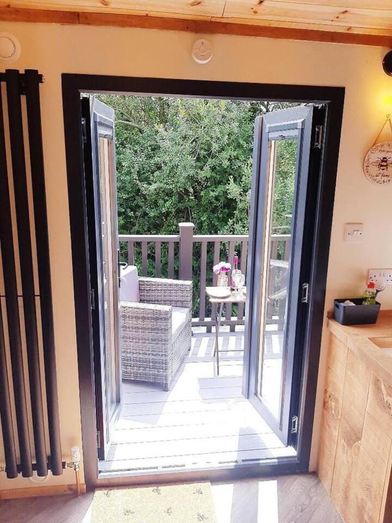 Luxury Shepherds Hut With Spa Hot Tub On Anglesey image