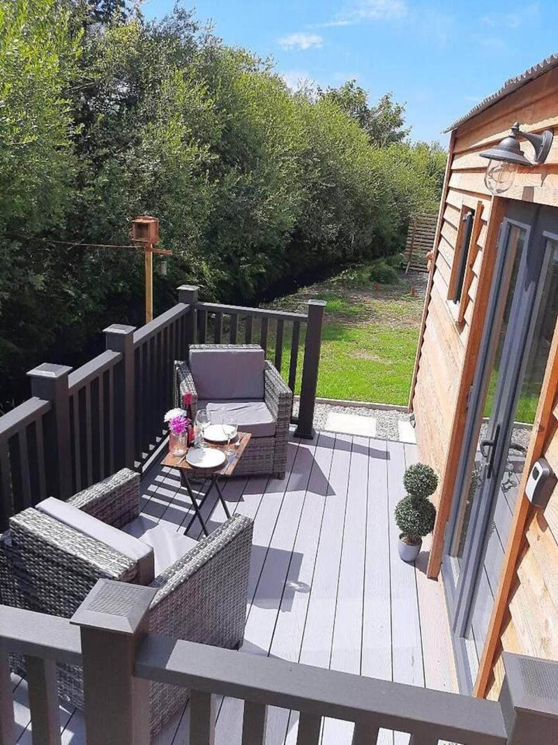 Luxury Shepherds Hut With Spa Hot Tub On Anglesey image