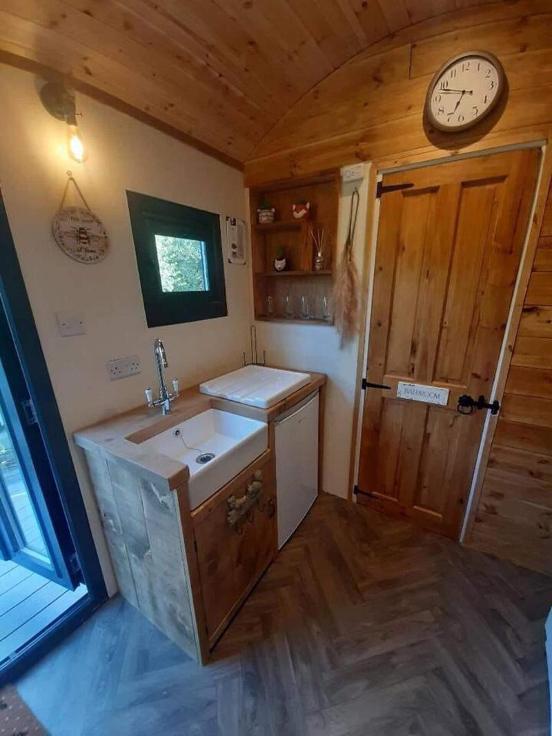 Luxury Shepherds Hut With Spa Hot Tub On Anglesey image