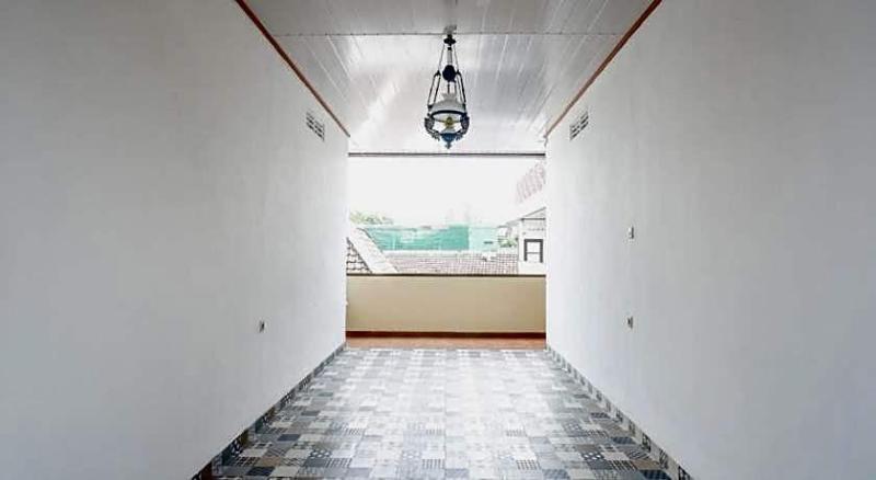 Urbanview Hotel Telu Wolu Monjali image