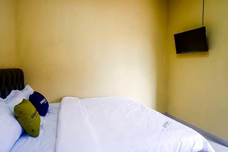 Urbanview Hotel Telu Wolu Monjali image