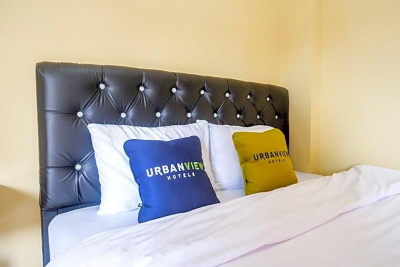 Urbanview Hotel Telu Wolu Monjali image