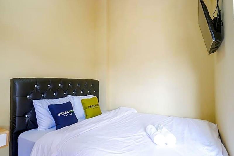 Urbanview Hotel Telu Wolu Monjali image