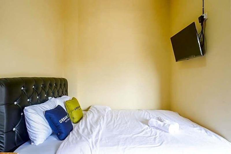 Urbanview Hotel Telu Wolu Monjali image