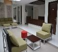 Lobby
 di Empire Suites Hotel