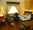 Room
 di M Suites Hotel
