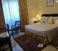 Room
 di Al Muraqabat Plaza Hotel Apartments