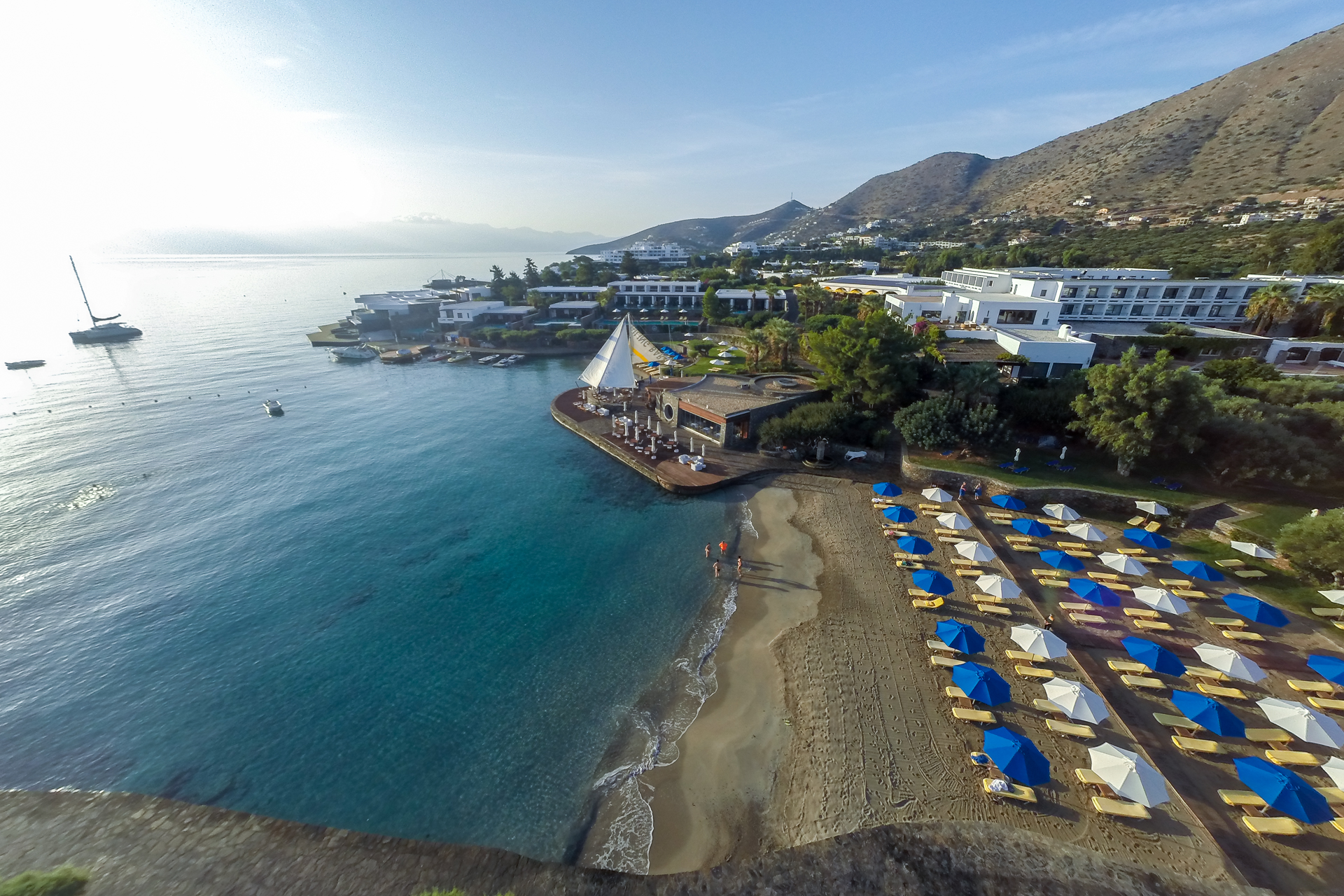 Photo of Elounda Bay with bright fine sand surface