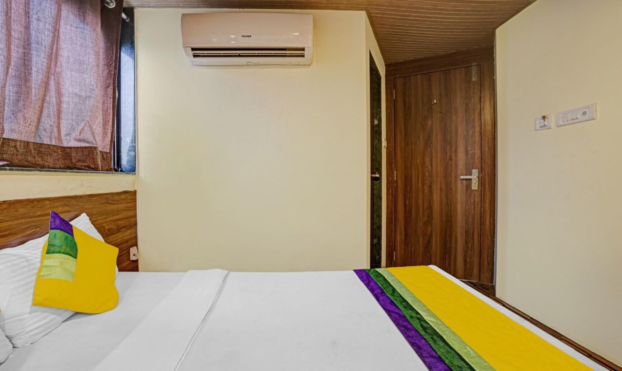 New Harshita Inn By Glitz Hotel