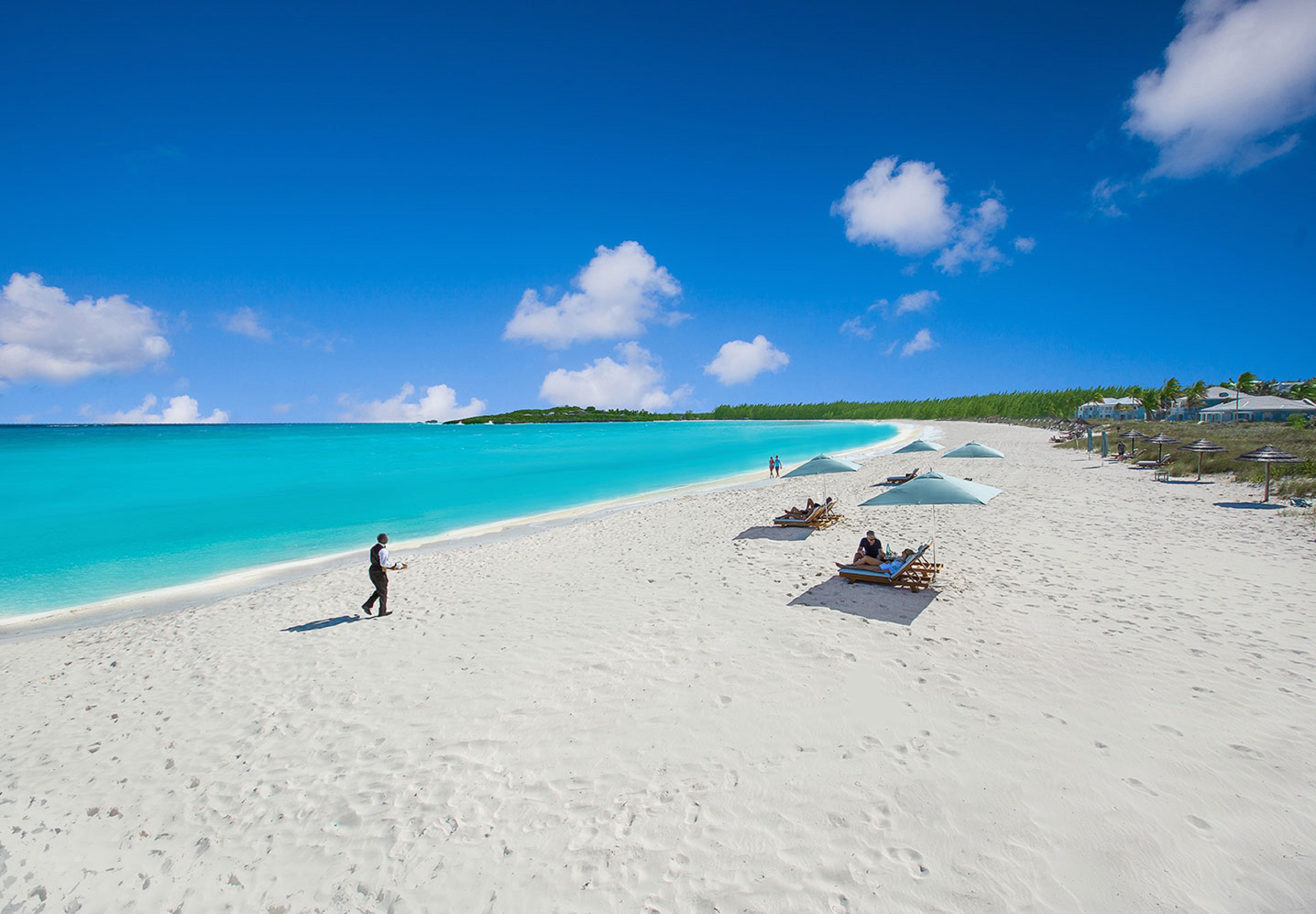 Photo of Sandals Emerald Bay beach with white fine sand surface