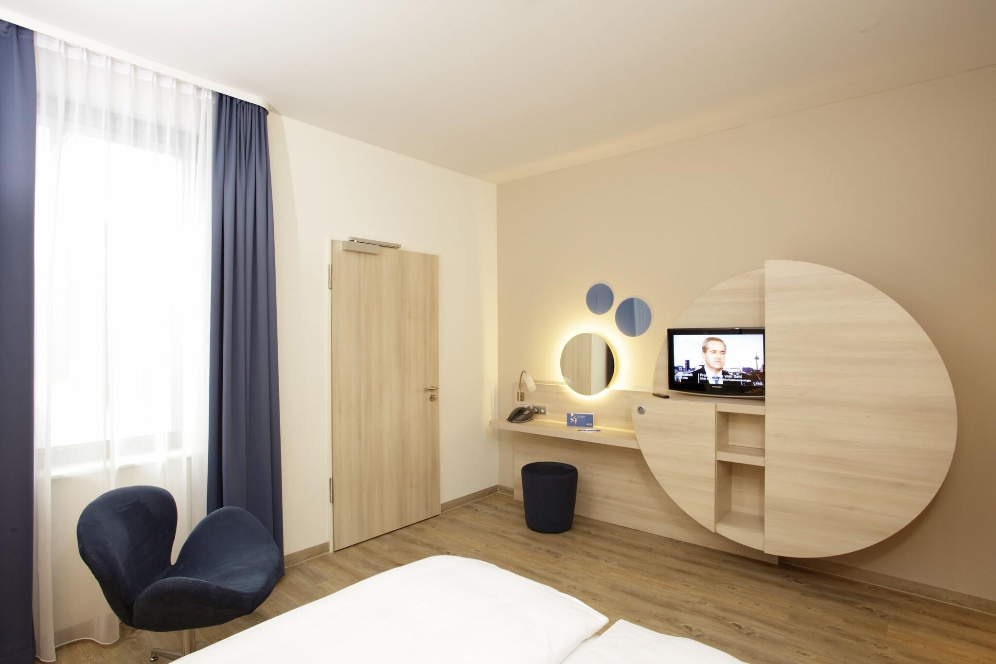 Chambre avec 2 lits, confort