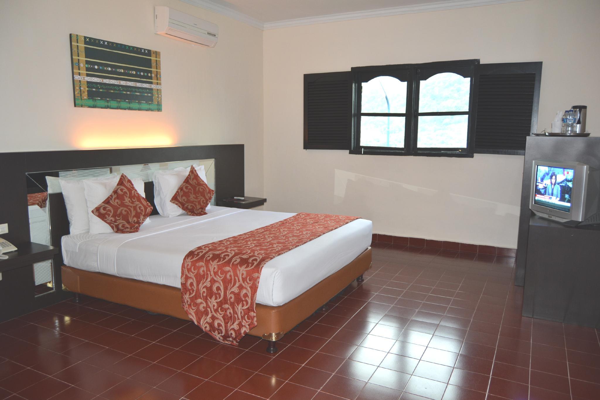 Danau Toba International Cottage