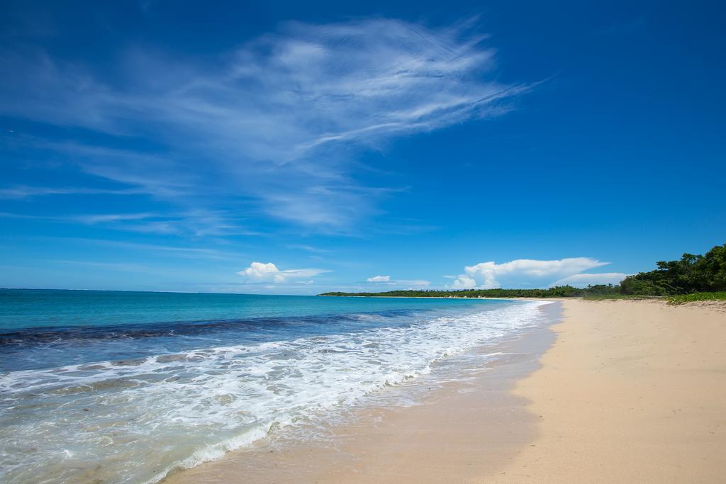 Foto van Natadola Beach met turquoise puur water oppervlakte