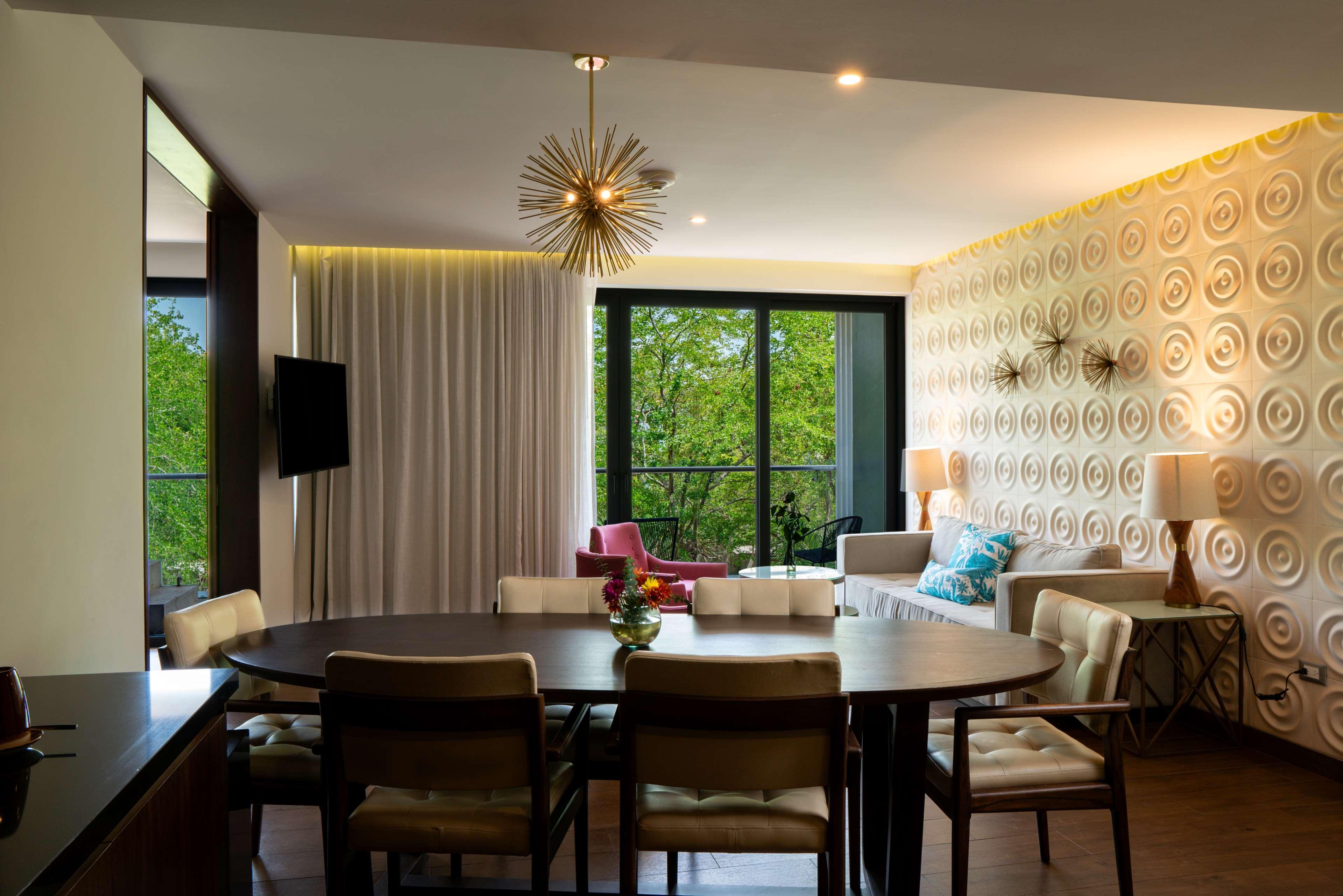 The Fives Downtown Hotel, Curio by Hilton