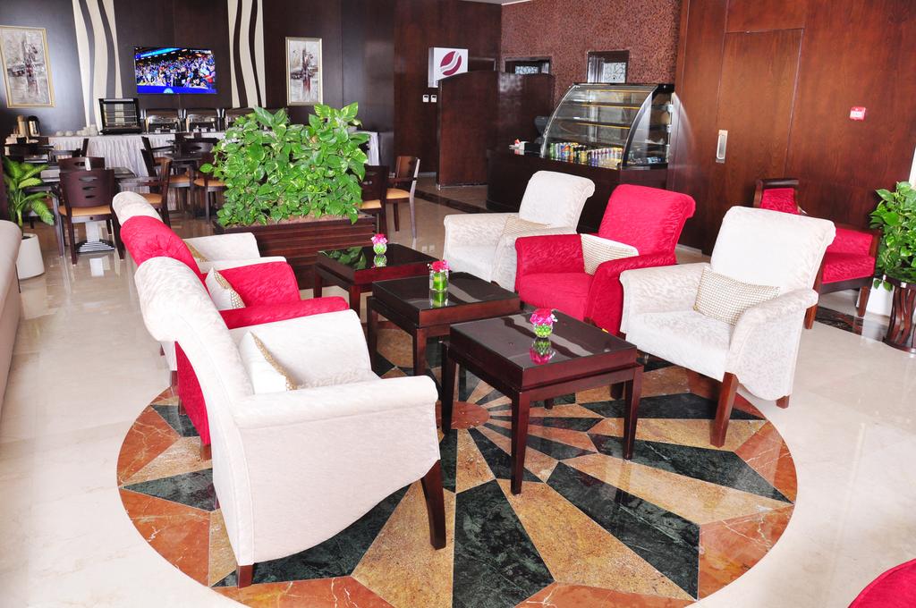 Ewan Ajman Suites Hotel - attēls