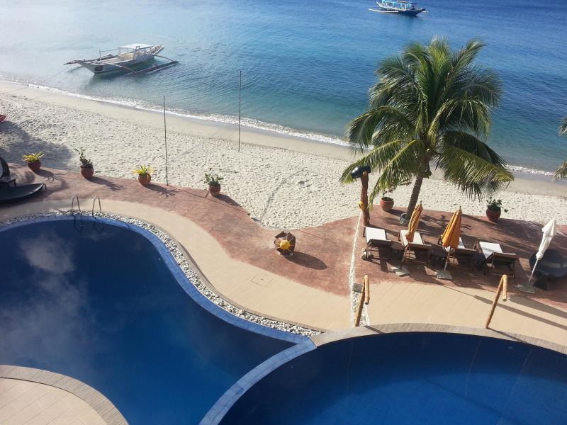 Sunset at Aninuan Beach Resort by null