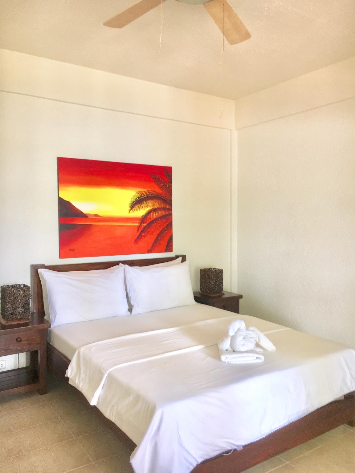 Sunset at Aninuan Beach Resort by null