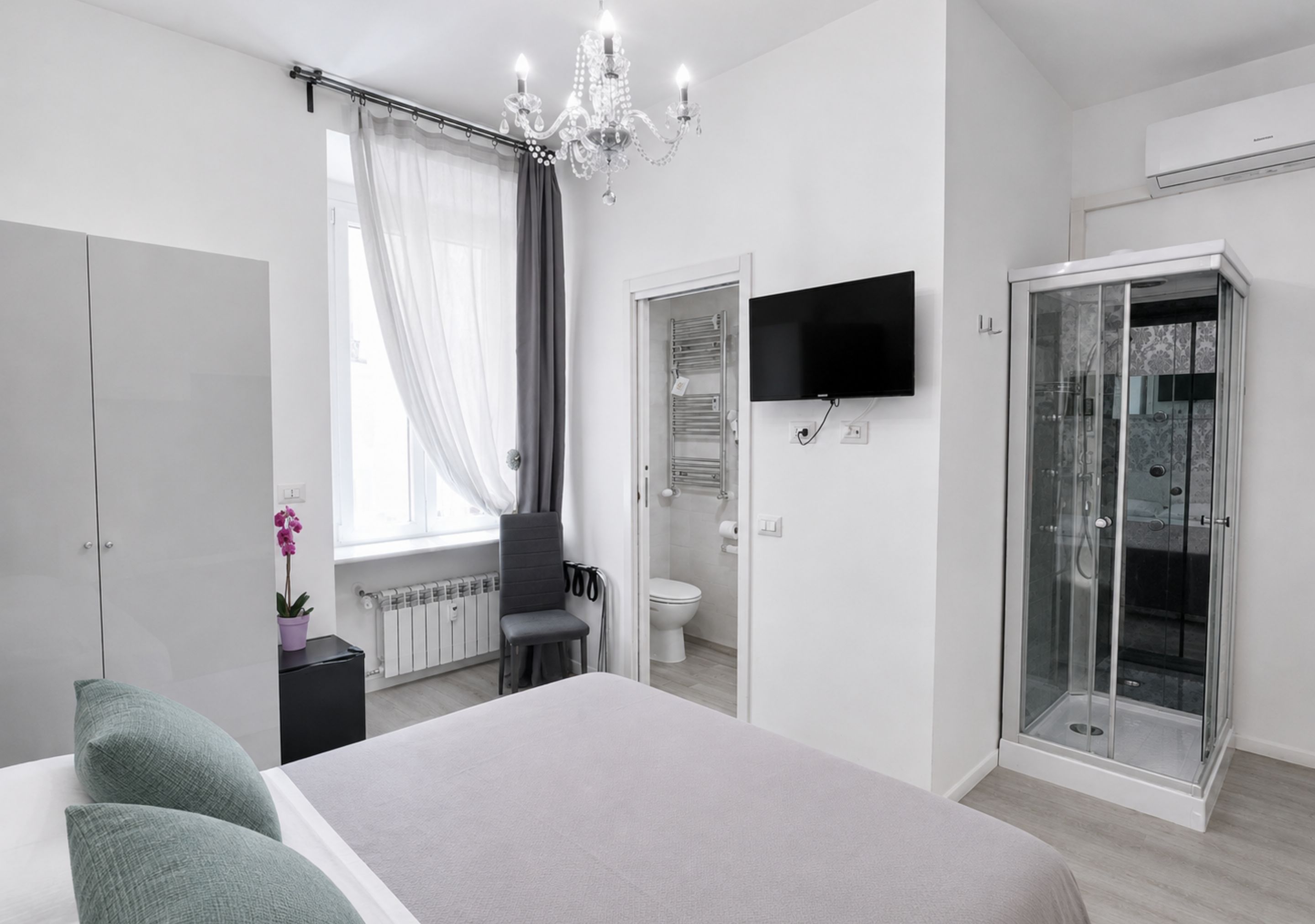 Inside Roma Rooms by DOT Suites