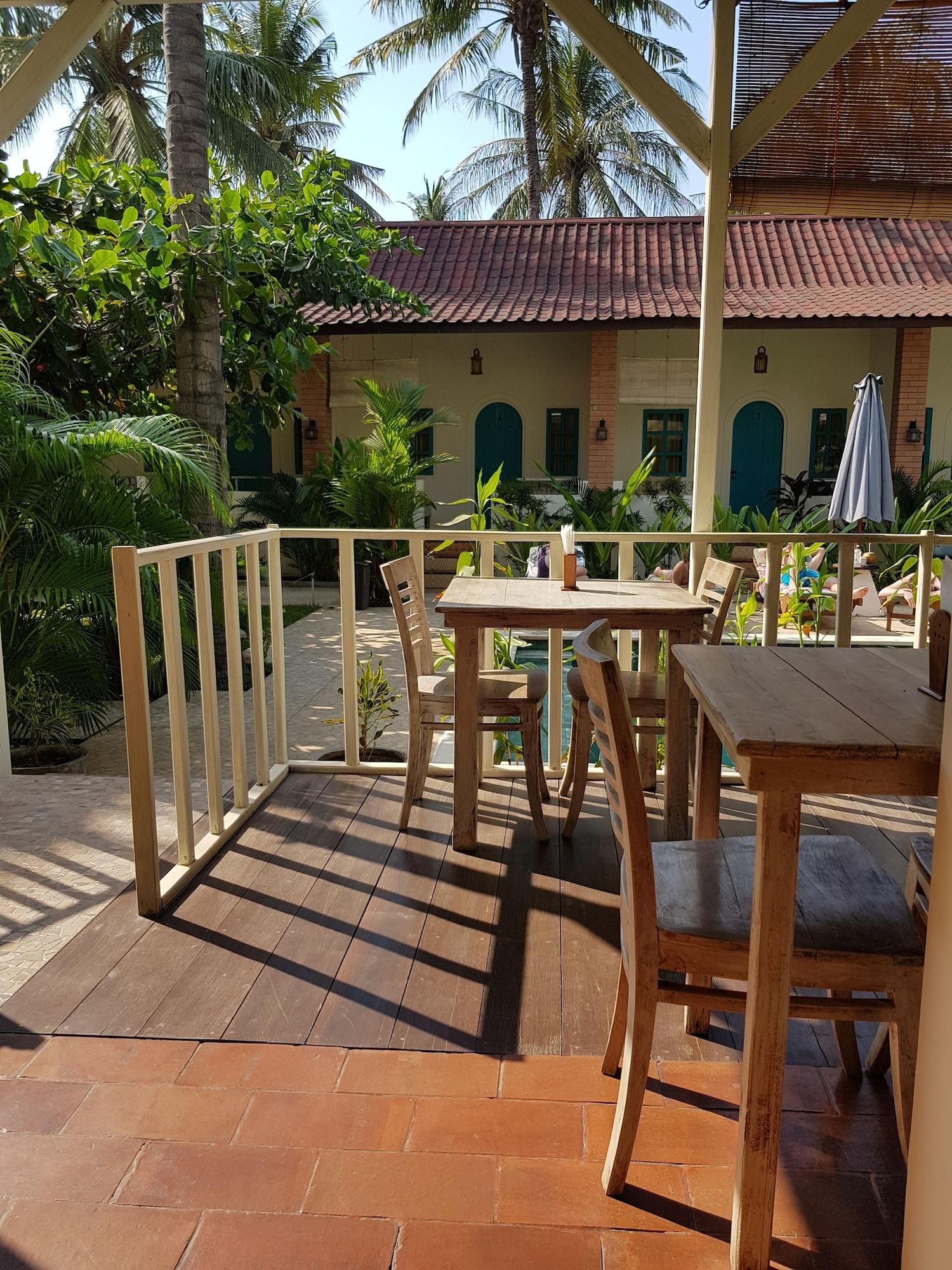 White Coconut Cottage