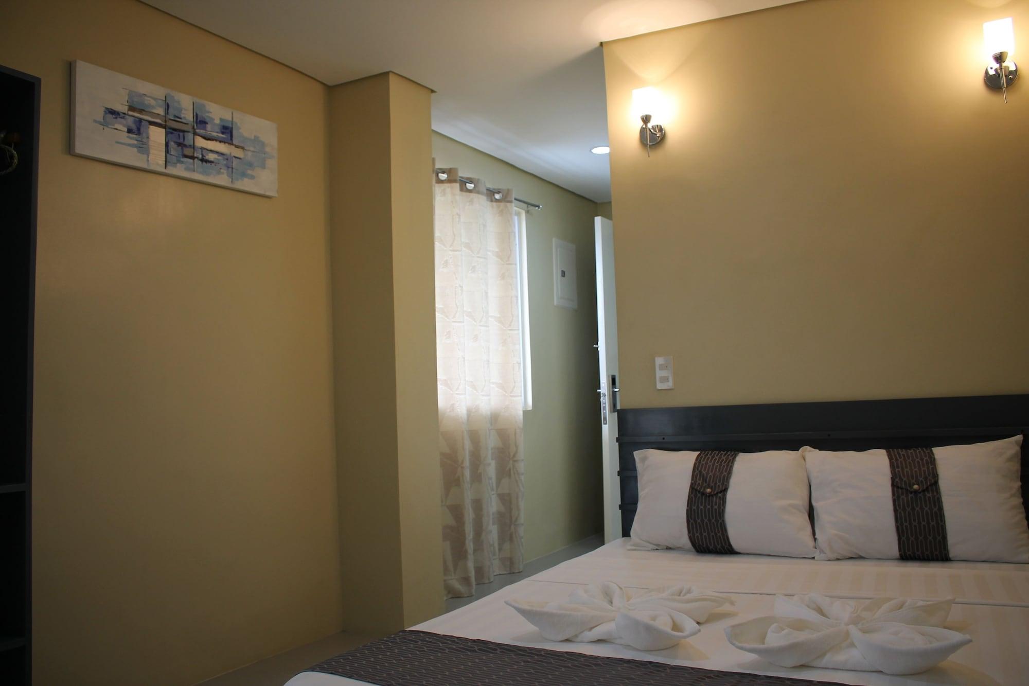 Rusville Hotel & Residences