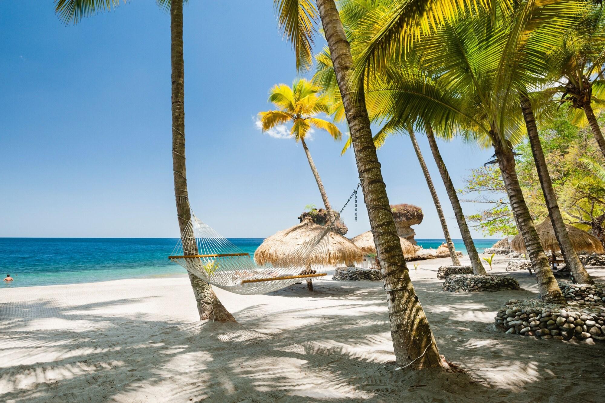 Foto de Playa Anse Chastanet con arena de concha brillante superficie
